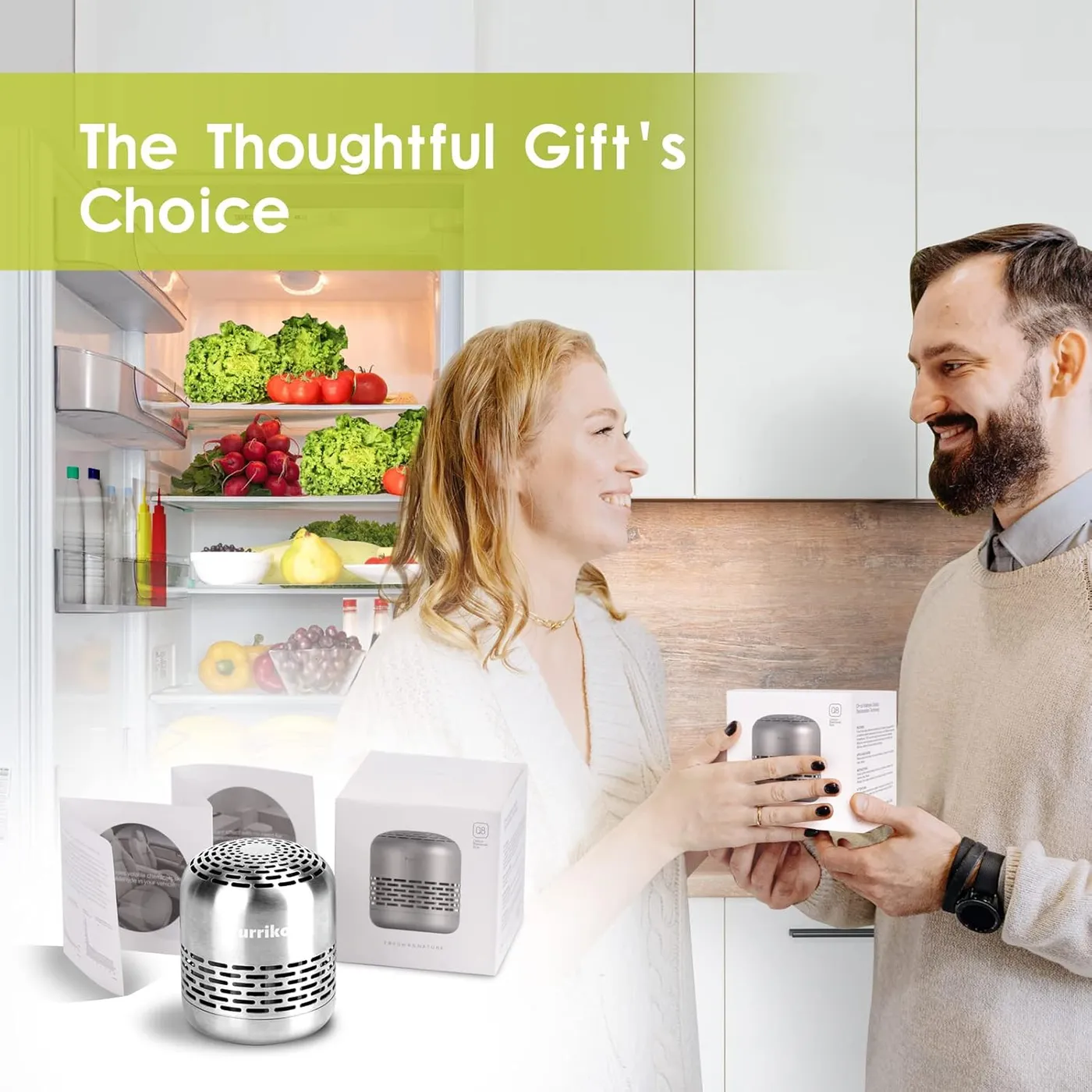Man handing a boxed Purriko refrigerator deodorizer to a woman in a kitchen, positioning the product as a thoughtful housewarming or practical gift