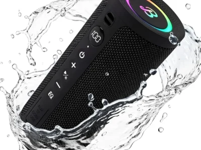 BassBloom Roar 3 portable Bluetooth speaker in black with RGB light ring, splashing in water