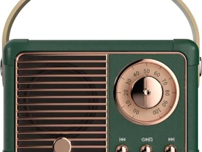 Dosmix Retro Bluetooth Speaker in green, front view showing the rose-gold tuning dial, control buttons and woven grille