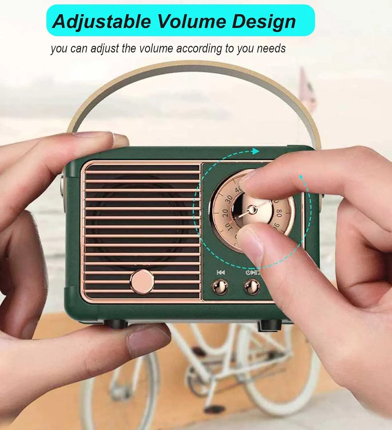 Hands turning the rose-gold volume dial on the green Dosmix retro Bluetooth speaker