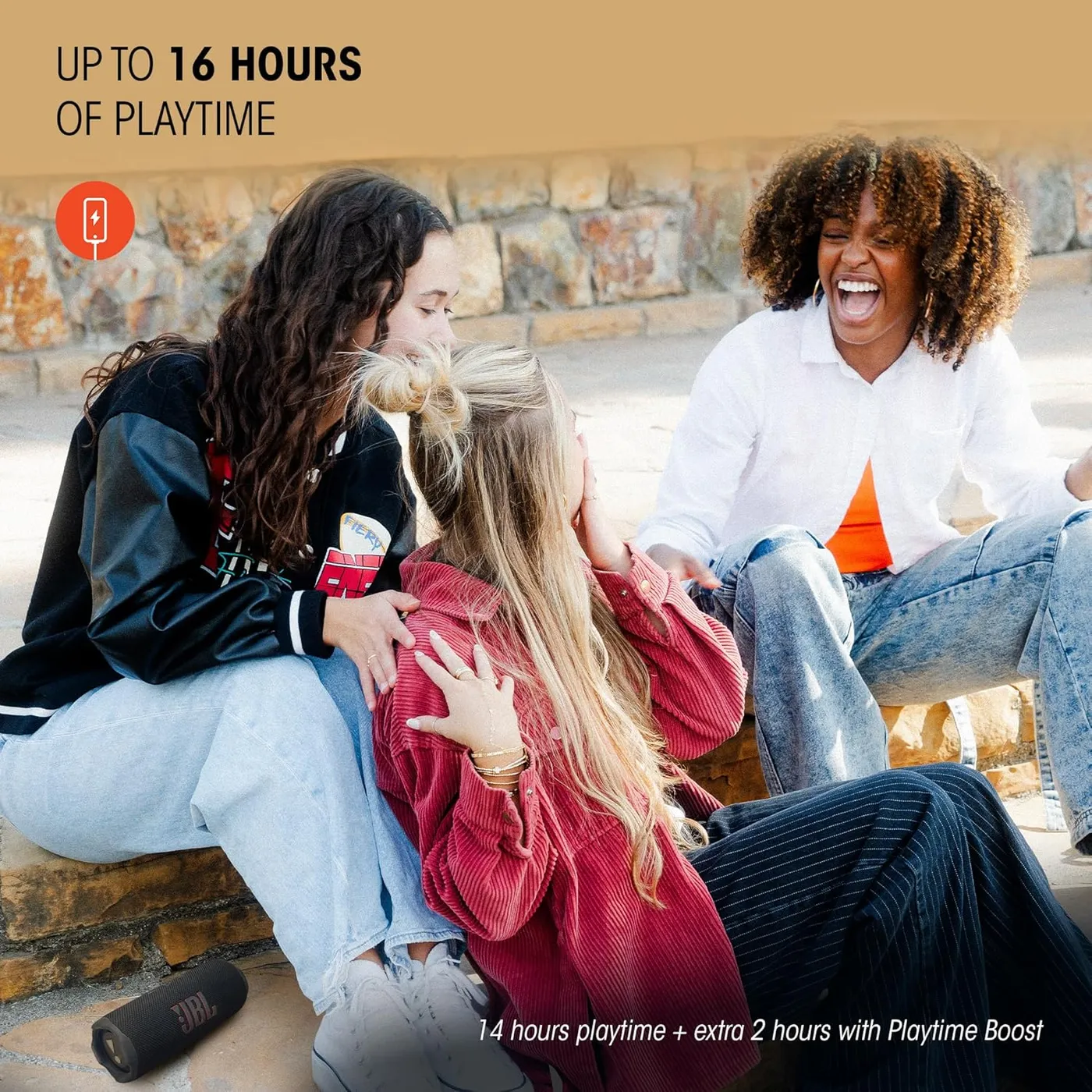 Group of friends listening to the JBL Flip 7 outdoors, illustrating the 14-hour rated battery extended to 16 hours with Playtime Boost