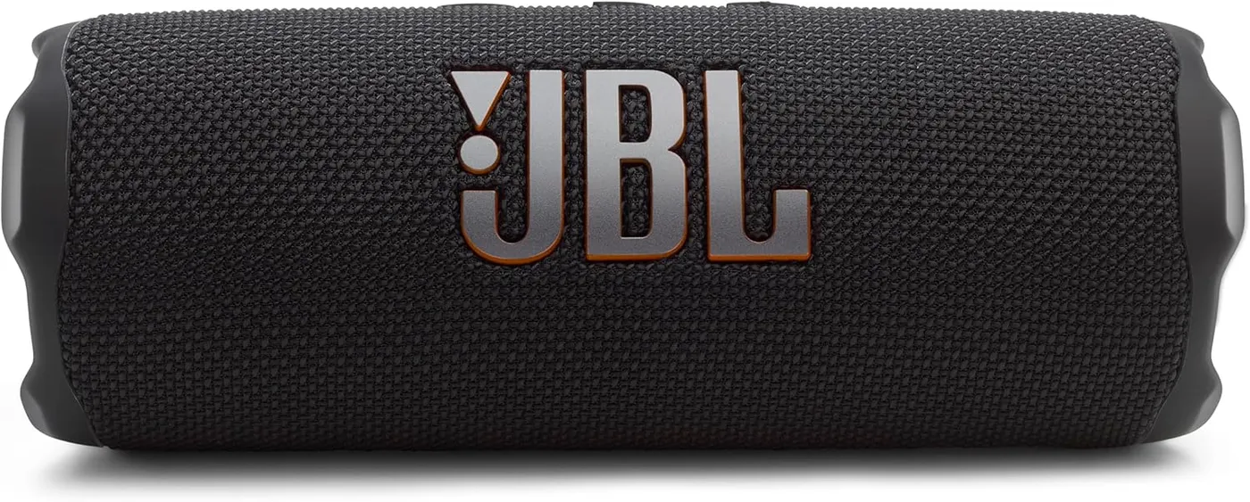 JBL Flip 7 portable Bluetooth speaker resting horizontally with the JBL logo prominently displayed on the fabric grille