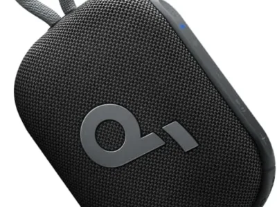 Soundcore Select 4 Go shower speaker in black, angled view showing the woven fabric grille and silicone carry loop
