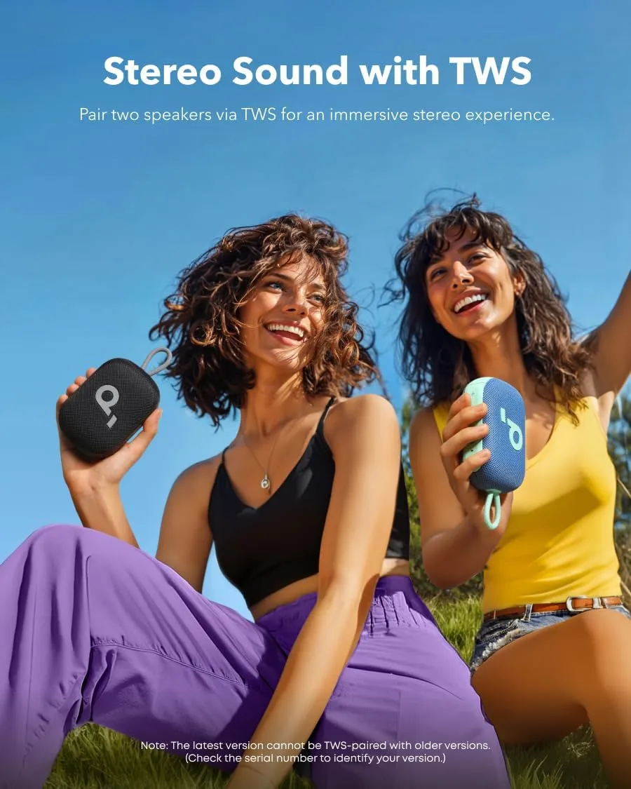 Two people outdoors each holding a Soundcore Select 4 Go, demonstrating TWS pairing for wireless stereo sound