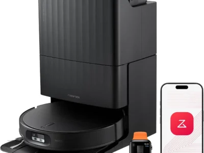 Roborock Qrevo Edge 2 Robot Vacuum and Mop in black, parked in its tall dock beside a smartwatch and phone app
