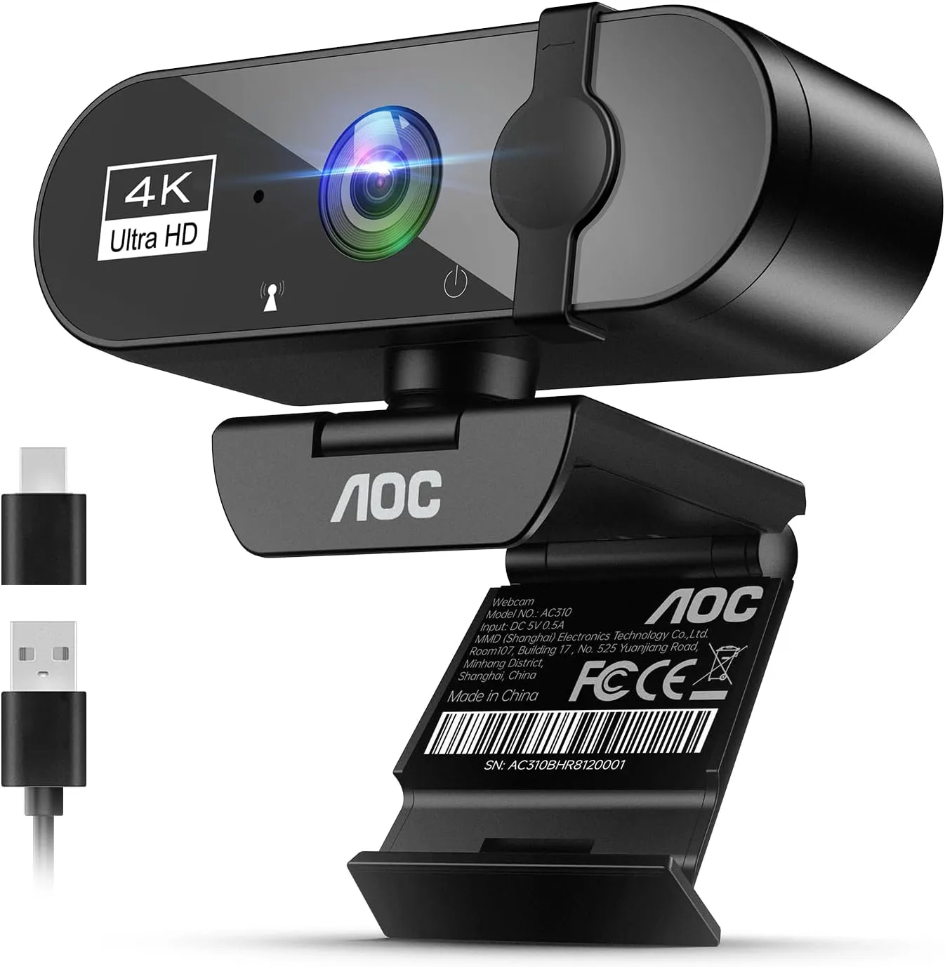 AOC AC310 4K webcam three-quarter view with sliding lens cover, clip stand, USB-A cable and USB-C adapter