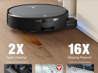 ECOVACS DEEBOT T90 Pro Omni on a hardwood floor with its extended roller edge along a baseboard, plus roller callouts