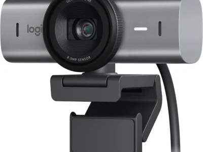 Logitech MX Brio 4K Webcam in graphite grey with a ringed lens, noise-reducing mic slots and a clip mount
